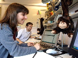 Animatronic monkeys keep graduate student Rachel Kern company